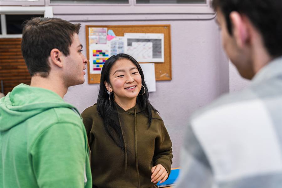 Students talking together at school